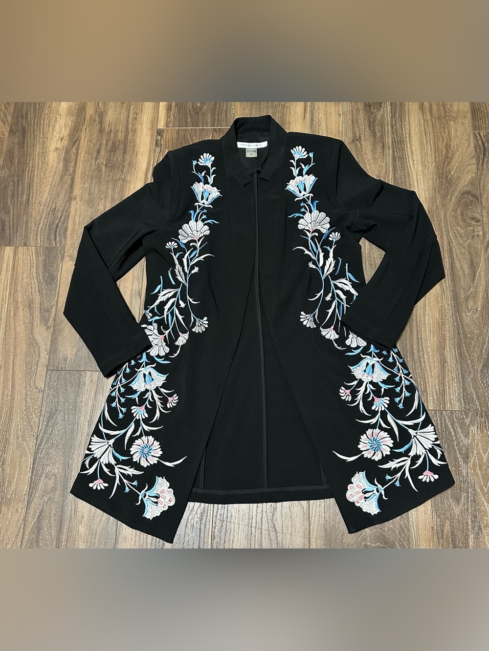 Peter Nygård Black Coat with Blue Label Stitching